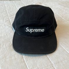 Never Worn. I Think It Is A Men’s Cap But Obviously Can Be Worn As Woman’s As Well Black Hats With Logo Patch, One Size, Casual Black 5-panel Snapback Hat, Black Hat With Short Brim For Streetwear, Black Short Brim Hat For Streetwear, Sporty Short Brim Hat For Streetwear, Classic Black Snapback Hat With Short Brim, Black Urban Hat With Short Brim, Black Urban Baseball Cap With Short Brim, Urban Black Baseball Cap With Short Brim