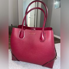 Burgundy Michael Kors Handbag With Middle Zipper Compartment And Two Open Sections. Within The Middle Zipper Is 5 Pockets And One Zipper Pocket. Little To No Blemishes On Bag. Classic Michael Kors Bag For Daily Use, Burgundy Satchel With Handles For Shopping, Burgundy Double Handle Satchel For Shopping, Classic Michael Kors Satchel Bag, Michael Kors Burgundy Shopping Bags, Michael Kors Classic Satchel For Daily Use, Classic Michael Kors Satchel For Daily Use, Burgundy Satchel With Detachable Handle For Shopping, Burgundy Top Handle Shoulder Bag With Branded Hardware