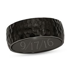 a black ring with the number 917 on it's center and engraved in silver