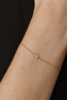 DETAILS Metal - 14k yellow gold Stone(s) - 0.08tcw Diamond Length - 6-7 inches WHY WE LOVE IT From our Dainty Diamonds Collection, the Luna Bracelet features two baguette diamonds surrounded by round diamonds in a square setting. This bracelet is a subtle and sweet touch of sparkle for your wrist stack. SHIPPING + RETURNS Learn about our Return + Exchange Policy here. LET'S CHAT! Don't see your size? Curious about something? Don't be shy, if you have any questions we would love to hear from you. Send us an email at hello@lpriorijewelry.com. Or to make an appointment with one of our Sales + Design Consultants click here. Dainty Gold Bracelet Classy, Delicate Gold Bracelet Classy, Sales Design, Diamonds Collection, Stacking Jewelry, Wrist Stack