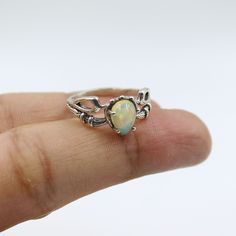 💍 Ethiopian Opal Ring, Fire Opal Pear Ring, Women Designer Ring, 925 Sterling Silver, Gemstone Ring, Surprise Gift, handmade Ring, Anniversary Gift, Jewelry Gift Gemstone Name :  Ethiopian Opal Purity: 925 Parts Per 1000 Metal :  925 Sterling Silver  Ring Size :  All Size Available Weight : 3.20 gm 💎About Gemstone This crystal enhances the connection between body and spirit, restoring balance and promoting positive emotions. Its high-frequency vibration improves focus and helps individuals manifest their desires more quickly. Ethiopian Opal is believed to enhance inner vision and provide deep insight into one's life path. Add this beautiful one little thing of galactic shine to make you feel unique and to transform your lives. Perfect for any kind of outfit and every occasion. We accept Sterling Silver Opal Ring With Accent Stones For Promise, Sterling Silver Opal Ring With Prong Setting For Promise, Opal Promise Ring Stamped 925, Sterling Silver Opal Ring For Promise, Fire Ring, Ethiopian Opal Ring, Pear Ring, Party Kleidung, Surprise Gifts