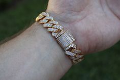 FAST SHIPPING!*TRUSTED SELLER**2300+ TRANSACTIONS* -Will be shipped through USPS with First Class Mail that includes tracking so you'll get it quick! -Don't confuse this with those cheap low quality cuban links that have glued in stones. -Premium 14k white gold OR 18k yellow gold plated diamond cuban link Bracelet! -Plating is PVD which is the highest quality. -Stones are high quality VVS simulated lab diamonds(CZ)! Hand prong set and not glued in like the cheap ones! -Very nice box clasp! -13mm Luxury Cuban Link Bracelet With Bling, Luxury Bling Cuban Link Bracelets, Gold Cuban Link Tennis Bracelet With Diamond Accents, Gold Tennis Bracelet With Diamond Accents And Cuban Link, Gold Iced Out Tennis Bracelet For Anniversary, Yellow Gold Cuban Link Tennis Bracelet With Cubic Zirconia, Classic Cuban Link Bracelet With Cubic Zirconia, Cuban Link Yellow Gold Tennis Bracelet With Cubic Zirconia, Gold Diamond Cuban Link Bracelet With Vvs Clarity