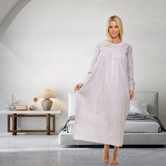 Step into the elegance of yesteryear with the ADR Vintage Victorian Nightgown by Alexander Del Rossa. This exquisite nightgown combines timeless style with modern comfort, making it a must-have in your sleepwear collection.

- Material: 100% Cotton Poplin
- Color: White Floral on Gray
- Size: XS
- Gender: Female
- Features: Round neck with lace trim, slightly puffed sleeves, long set-in sleeves with buttoned cuffs, deep pockets, A-line silhouette, ankle-length hem

Crafted from premium cotton, t Feminine Long Sleeve Cotton Nightgown, Elegant Cotton Nightgown For Sleepover, Feminine Cotton Nightgown For Overnight, White Cotton Nightgown For Sleepwear, White Cotton Nightgown For Overnight, Elegant Cotton Nightgown For Bedtime, Elegant Cotton Nightgown For Daywear, Nightgown Vintage, Victorian Nightgown