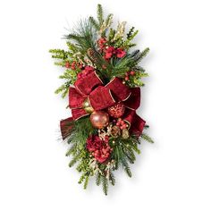 a christmas wreath with poinsettis, pine cones and other holiday decorations on it