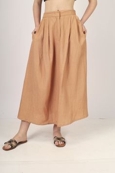 "Beige Pleated Maxi skirt for women skirt, Long skirt, Custom made, Made to order, Plus size -Model height: 5'7\" wearing size S -Length: 38\" -Fit: A-line -Closure: Front button and zipper" Full-length Relaxed Skirt With Pockets, Relaxed Full-length Skirt With Pockets, Relaxed Maxi Skirt With Pockets, Beige Maxi Skirt With Elastic Waistband, Pleated Relaxed Long Skirt, Spring Full Length Brown Skirt, Brown Full Length Skirt For Spring, Brown Full-length Skirt For Spring, Casual Full Length Pleated Skirt For Summer