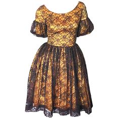 Gorgeous 1950s Black   Gold Silk Lace Fit and Flare Glitter Vintage 50s Dress | From a unique collection of rare vintage Cocktail Dresses at https://www.1stdibs.com/fashion/clothing/evening-dresses/cocktail-dresses/. Vintage 1950s Dresses Parties, Skirt Couture, Satin Lace Dress, Flare Cocktail Dress, Beaded Flapper Dress, Fit And Flare Cocktail Dress, Court Dresses, Fall Attire, Vintage Dresses 50s