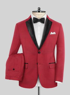 Experience the infusion of passion and individuality into your attire with our Red Tuxedo Suit, effortlessly blending classic charm with contemporary allure. This garment transcends conventional fashion boundaries and evolves into a true expression of your identity. Meticulously crafted from a lavish wool blend, the suit boasts a mesmerizing solid pattern and a profound crimson hue that infuses your ensemble with refined vibrancy. Whether you're sealing deals in the corporate arena or stealing t Designer Single Button Fitted Suit, Designer Fitted Single Button Suit, Designer Fitted Suits For Formal Occasions, Red Fitted Elegant Suit, Elegant Red Fitted Suit, Elegant Fitted Red Suit, Fitted Single Button Silk Suit, Red Slim Fit Suits For Formal Occasions, Red Slim Fit Formal Suits