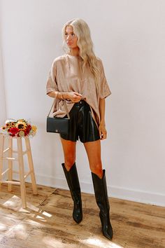 - Step into your luxe era with this dreamy top! The crushed satin is giving major glam vibes, perfect for everything from desk days to coffee dates. Give your look a little glow-up with this fab piece! - Unlined material with a satin finish and a crushed texture - A scoop neckline - Short sleeves - A relaxed silhouette that ends in straight hemline Chic Sheen Tops For Fall, Chic Fall Tops With Sheen, Chic Sheen Blouse For Night Out, Chic Blouse With Sheen For Night Out, Chic Brown Party Top, Trendy Beige Blouse For Night Out, Chic Sheen Top For Spring, Chic Spring Top With Sheen, Chic Brown Party Blouse