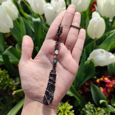 This unique necklace is perfect for anyone who loves a witchy and mystical aesthetic. The necklace is in the shape of a broom pendant, 100% handmade from different crystals:  Black Tourmaline + Moonstone + Sunstone + Apatite It is made from oxidized copper that is polished to shine. The pendant comes with a black adjustable strap. Size: 12*1.5cm Looking for witchy/Halloween aesthetic pendants? check these out https://www.etsy.com/listing/1446352794/ https://www.etsy.com/listing/1571485217/ Have any questions? Be sure to message me :) Check out my Instagram profile: @bronzaii.jewelry Witchy Halloween Aesthetic, Ocean Witch, Mystical Aesthetic, Black Tourmaline Necklace, Crystals Black, Witchy Halloween, Gothic Pendant, A Broom, Witch Broom