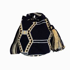 "Wayuu Mochila bag / Crossbody bag / Market Tote / Handmade Summer bag / Beach bag / Woven Boho Handbag Your ultimate summer accessory! This beautiful and unique mochila bag is handwoven by Wayuu artisans from La Guajira, Colombia. It is an ancestral work of art made in a unique weaving technique with a magic needle and Wayuu thread. It is super versatile, which makes it the perfect accessory to be used out in the city or to spend a day at the beach. With its large crossbody strap, you will want Ancestral Work, Summer Bags Beach, Boho Handbag, Mochila Bag, Boho Handbags, Wayuu Bag, Summer Tote, Summer Bag, Market Tote