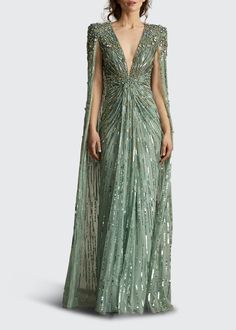 Luxury Embellished Sequin Evening Dress, Luxury Hand Embellished Sequin Dress For Galas, Luxury Embellished Long Sequin Dress, Luxury Evening Maxi Dress With Intricate Embroidery, Luxury Festive Gown With Pearl Embroidery, Luxury Festive Dresses With Embellishments, Luxury Pearl Embroidered Evening Dress For Festive Occasions, Luxury Gown With Crystal Embellishments For Party Season, Luxury Embellished Long Skirt Dress