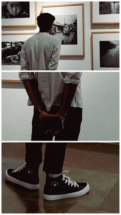 three different shots of a man standing in front of some framed pictures and looking at his shoes