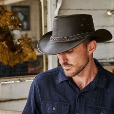 The Down Under Leather Hat can be crushed but still keeps it's shape. Made from sturdy Buffalo hide leather treated with waxes and oils to protect it from the elements. #Hat  #MensFashion  #OutbackStyleHats   #OutbackHats Country Style Fedora With Flat Bill For Outdoor, Western Fedora Hat Bands For Outdoor Activities, Western Flat Brim Hats For Outdoor Activities, Western Wide Brim Hat For Outdoor Activities, Western Style Wide Brim Fedora For Outdoor Activities, Western Wide Brim Fedora For Outdoor Activities, Casual Leather Hats With Sweatband, Western Flat Bill Hat Bands For Travel, Adjustable Rugged Fedora For Outdoor