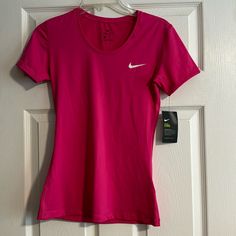 Nike Women’s Dry Fit Size M Fitted Nike T-shirt For Summer, Nike Fitted Sports Shirt, Nike Fitted Shirt For Sports, Fitted Nike Sports Shirt, Fitted Nike Shirt For Sports, Pink Moisture-wicking T-shirt, Nike Sporty Spring Shirt, Nike Sporty Shirt For Spring, Nike Fitted Casual Shirt