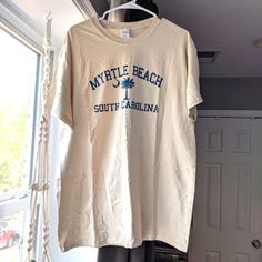 Nwot (New Without Tags) South Carolina Myrtle Beach Palmetto Tee Shirt! Cream / Nude / Beige Color With Navy / Blue Print. Bundle Any 3 Items Marked With A "" To Receive A 3 For $15 Discount (+$5 For Each Additional Item After 3 With A "" In The Listing)! Thanks For Looking!! Beige Crew Neck Top For Vacation, Summer Beige Crew Neck Top, Beige Crew Neck Top For Beach, Beige Cotton Shirt For Vacation, Cream Crew Neck Top For Vacation, Beige Cotton Tops For Beach Season, Summer Cream Shirt With Crew Neck, Beige T-shirt For Beach, Summer Season, Cream Crew Neck Shirt For Summer