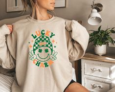 Lucky Charm Sweatshirt,Happy Shamrock Sweatshirt,St Patrick's Day,Lucky Charm Sweatshirt,Irish Sweatshirt,Irish Day Shirt, Lucky Sweatshirt, We design trendy sweatshirts that you can use in every important day of your life. We produce beautiful and quality designs that can be used in all kinds of activities that you will do with your family or friends. These designs will offer you and your environment a unique complement. We are very excited to bring you our high quality and soft, trendy sweatsh Irish Sweatshirt, Trendy Sweatshirts, Irish Sweater, Sweatshirt Colors, Single Shirt, Rainbow Sweater, Saint Patricks, St Pattys, St Pattys Day