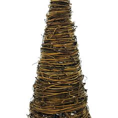 a small christmas tree made out of branches