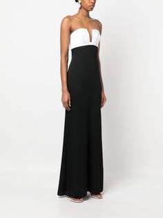 two-tone fluted gown from ROLAND MOURET featuring black/white, stretch-silk, two-tone design, strapless, boned bodice, fluted skirt and rear zip fastening. Size Info UK Color Detail Black Made In China Material Outer: Silk 91%, Elastane 9%, Lining: Polyester 97%, Elastane 3% Season One Spring-Summer Season Two Spring-Summer Product dresses Brand Roland Mouret Size And Fit This piece fits true to size. We recommend you get your regular sizeModel is 1,75m / 5ft 8in wearing size 8 (UK) Strapless Fitted Evening Dress For Black-tie Events, Fitted Strapless Evening Dress For Black-tie Events, Fitted Strapless Dress For Black-tie Events, Strapless Dress With Fitted Bodice For Black-tie Events, Roland Mouret Dress, Crepe Maxi Dress, Trench Dress, Boned Bodice, Latest Fashion Design