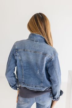 Greet the day with style in The Rue Denim Jacket! This chic button-down denim jacket features stretch denim for a modern, comfortable fit. The collared neckline, chest pockets, and side pockets offer plenty of style and storage. A raw hem and buttoned cuffs give this jacket a unique twist. Wear it with your favorite jeans and show off your fashionable side! Details + Fit 98% Cotton | 2% Spandex Runs True to Size Machine Wash Cold Hang Dry Denim Jacket Stretch Denim Collared Neckline Button Front