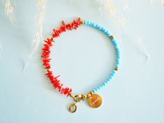 Uplift your looks with this fabulous anklet in the hottest summer hues, that oozes vibrancy and playfulness. A colorful statement bracelet, that will enhance your ankle with it's eye-catching vibe. It looks stunning on its own or layered for extra impact. --------------------- FEATURES ✦ Red coral beads ✦ Light blue glass beads ✦ Gold hematite stones ✦ 100% nickel free stainless steel chain and clasp closure --------------------- FREE standard shipping to Greece over 70€ - Code FREESHIPPING ---- Red Summer Bracelet Jewelry, Red Bracelet Jewelry For Summer, Red Bracelet With Colorful Beads For Summer, Red Round Beads Bracelets For Summer, Handmade Red Beaded Bracelets For Beach, Trendy Red Beaded Bracelets For Beach, Adjustable Red Anklets With Round Beads, Trendy Red Jewelry For Vacation, Red Summer Beach Bracelets