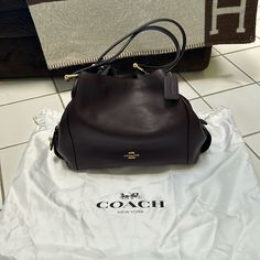 **Brand New Coach Genuine, Leather Handbag. Never Used Comes With Storage Sack. Smoke Free Home :) Color Is A Rich Sweet Cola Dark Brown Elegant Satchel With Dust Bag For Errands, Elegant Tote Bucket Bag For Errands, Elegant Bags With Removable Pouch For Errands, Elegant Bag With Removable Pouch For Errands, Elegant Bag For Errands With Handle Drop, Coach Top Handle Bucket Bag, Coach Bucket Bag With Top Handle, Classic Satchel With Dust Bag For Errands, Elegant Bucket Bag With Handles For Errands