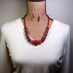 "7x7mm AAA Quality Red Coral Stem Slices on the Straps, up to 20x20mm AAA Red Coral in the Body, with .925 Silver Beading, 925 Siver Plate in the Large Balls and .925 Silver Clasp Necklace and Earrings Handmade by me, \"Limpin' Lizard\". This Silver Hook and Eye Clasp Necklace is 19\" inches long but can be made longer by using the 3\" Silver Extention Chain (chain can be removed if buyer prefers), or shortened if buyer prefers. Earrings are available with your choice of Silver French Wire Hooks Red Jewelry Sets With Round Beads For Gift, Red Polished Beads Round Jewelry, Red Sterling Silver Necklace With Matching Earrings, Red Sterling Silver Jewelry Sets As Gifts, Red Beaded Sterling Silver Jewelry, Red Round Jewelry With Silver Beads, Red Round Silver Beaded Jewelry, Red Jewelry With Silver Beads, Terracotta Jewellery