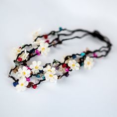 This beautiful piece is made from floral lace and beads. This necklace is comfortable to wear and adds a touch of elegance to any outfit. Our floral necklace is the perfect choice for any occasion. The delicate lace and stunning flowers will impress anyone on your list! Whether you're looking to add a touch of elegance to your outfit or show your loved one how much you care, this flower necklace is sure to please. Note that the colors of the small beads around the necklace vary since each necklace is handmade when ordered. 🪡 PRODUCT DETAILS: * Materials: Oya, Needlework, Point lace, Bead * Durable design, high-quality craftsmanship * Perfect gift for women (mother, wife, girlfriend, daughter, granddaughter) 🪡 SHIPPING:All orders will be processed in standard 3-5 business days and will be Lace And Beads, Stunning Flowers, Point Lace, Small Beads, Floral Crochet, Eyeglass Chain, Floral Necklace, Flower Necklace, Accessories Bracelets