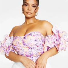 Brand New With Tag Floral Girly Off The Shoulder Top. The Ruffle Sleeves Are Very Romantic, It Zips Up The Back And Gives A Corset Vibe. Pretty Little Thing Size 20 Purple Summer Blouse For Brunch, Summer Purple Blouse For Brunch, Off-shoulder Floral Print Party Tops, Off-shoulder Floral Print Party Blouse, Summer Floral Print Purple Blouse, Summer Purple Floral Print Blouse, Trendy Purple Summer Blouse, Purple Ruched Tops For Spring, Spring Purple Ruched Tops