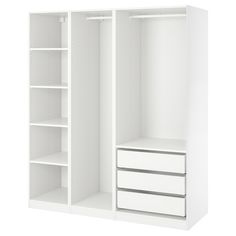 an open white closet with shelves and drawers