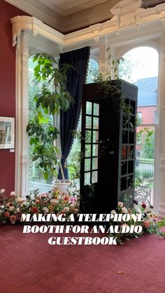 a phone booth with flowers and plants in front of the door that says making a telephone booth for an audio guestbook