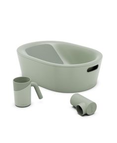 an image of a bathtub with two cups