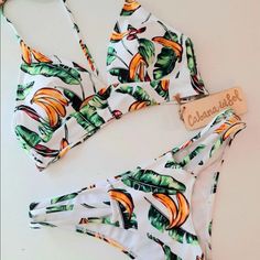 Brand New Without Tags, Never Worn. Cabana Del Sol Women’s White Banana Bikini Sz Small. Shipping Included In The Price. Pet And Smoke Free Home. Buy More Save More. Pm Me For Details. Moto Biker Jacket, Ruffle Swimsuit, 2 Piece Swimsuits, Beach Wear Dresses, Black Cross Body Bag, Tropical Print, Womens Swim, Navy And White, String Bikinis