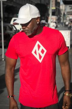 Mighty Nupe Diamond-K tee, red Urban Red Sports T-shirt, Red Urban Sports T-shirt, Red Urban T-shirt With Logo Print, Red Graphic Print T-shirt For Workout, Red Crew Neck T-shirt For Gym, Urban Sports T-shirt With Branding, Red Graphic Tee With Branding, Urban Red Tops With Logo Print, Urban Red Top With Logo Print