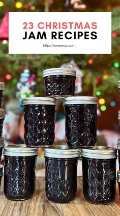 twelve jam jars with the words, christmas jam recipes in front of a christmas tree