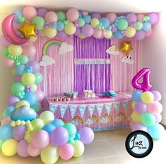 a birthday party with balloons, streamers and decorations