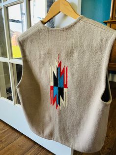 Oh, my goodness! I am so excited to offer this one-of-a-kind piece in my shop. This is a hand-woven Ortega's Chimayo wool vest. It is in beautiful vintage condition. The details of this vest are just incredible. The craftmanship is second to none. You will not own a better made garment, The vest has a small dark spot just above one of the pockets. There is also some wear on the buttons. The design on the back is beautiful. The pockets are fully lined. The vest does not have a size on it. The shoulders measure 18 inches across and it is 21 1/2 inches long. You will love adding this piece to your vintage wardrobe collection. Carhartt Vest Outfit, Chimayo New Mexico, Fun Fits, Carhartt Vest, Clothing Upcycle, Boho Vest, Dream Weaver, Vintage Wardrobe, Cute Outfits For School