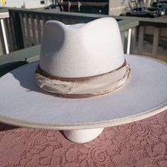 Adjustable Fedora Hat Bands For Rodeo, Fitted Hat Band For Kentucky Derby With Flat Crown, Adjustable Flat Brim Hat Band For Rodeo, Adjustable Wide Brim Top Hat For Ranch, Adjustable Fit Fedora For Country Events, Adjustable Flat Brim Felt Hat For Ranch, Elegant Adjustable Fedora With Flat Crown, White Adjustable Country Style Top Hat, Adjustable Brimmed Felt Hat For Kentucky Derby