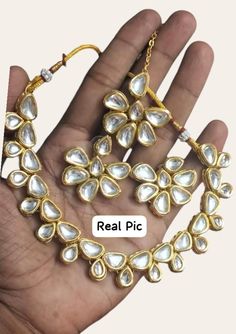 25%BULK ORDER DISCOUNT Coupon Code=SAVE25PERCENT 25% off when you buy 3 items https://www.etsy.com/shop/indianjewelrysets/?etsrc=sdt&coupon=SAVE25PERCENT         Indian Bridal Traditional Designer Antique Gold plated Studded Diamond & kundan Necklace Earrings Tika Jewellery Set  SHIPPING l be dispatched within 1-3 business day after the payment is clear. Items will arrive in 18-20 business days. The arrival time depends on some factors and different areas: We only ship to the confirmed address p Gold Jewelry Sets With Gota Work For Gifts, Silver Kundan Necklace With Gota Work For Gift, White Kundan Jewelry Sets As Gift, Kundan Necklace Hand Set As Gift, Kundan Necklace For Diwali Gift, Kundan Necklace As A Diwali Gift, White Bridal Necklace With Gota Work As Gift, White Bridal Necklace With Gota Work For Gift, Kundan Chandbali Bridal Sets Gift