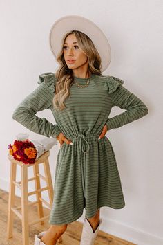 - Step out in charm with this darling mini dress! Featuring ruffled shoulders and a cinched waistline, it's perfect for effortless everyday elegance. - Unlined, ultra-soft material with a brown, blue, and green hued striped pattern - A crew cut neckline - Long sleeves with ruffled shoulder details - A functional drawstring to cinch the waist - Hidden side pockets - A relaxed yet flattering silhouette that ends in a straight mini dress length hemline Green Ruffled Mini Dress For Fall, Fall Mini Dress With Ruffle Sleeves, Casual Ruffle Sleeve Mini Dress For Fall, Casual Mini Dress With Ruffle Sleeves For Fall, Casual Ruched Mini Dress With Ruffle Sleeves, Fall Khaki Mini Dress, September Fashion, Concert Fashion, Everyday Elegance