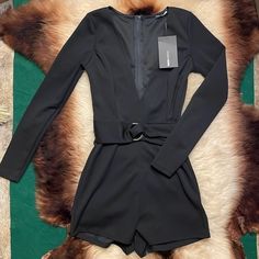 Brand New With Tags Fashion Nova Black Long Sleeve Sharlene Belted Romper Size Xs. Self Is 97% Polyester, And 3% Spandex Lining Is 100% Polyester Pit To Pit 13.5” Length 28” Inseam 2” Fitted Jumpsuits With Belt Loops For Night Out, Belted Jumpsuits And Rompers For Night Out, Fitted Belted Jumpsuits And Rompers For Date Night, Black Belted Jumpsuit For Party, Chic Black Jumpsuits And Rompers With Belt Loops, Trendy Fitted Belted Jumpsuits And Rompers, Black Belted Jumpsuit For Date Night, Black Belted Jumpsuits And Rompers For Fall, Romper With Train