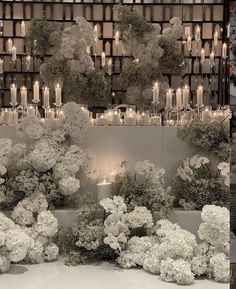 two pictures with flowers and candles in them