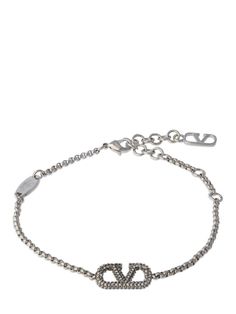 Find VALENTINO Vlogo Signature Crystal Bracelet on Editorialist. Maximum length: 21cm. Minimum length: 18cm. Silver-plated brass. Crystal. Logo detail. Adjustable clasp closure with logo detail Luxury Silver Jewelry With Metal Logo, Silver Metal Jewelry With Logo, Silver Metal Jewelry With Metal Logo, Luxury Metal Jewelry With Metal Logo, Designer Metal Bracelets With Logo Charm, Designer Silver Chain Bracelets, Designer Jewelry Bracelet With Logo Charm, Designer Logo Charm Bracelet Jewelry, Adjustable Silver Bracelet With Logo Charm