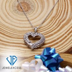 A Gift That Sparkles & Dazzles All: This timeless diamond heart pendant is sure to capture anyone’s heart. Fashioned with loads of brilliant white diamonds, this 1.00 carat heart necklace is romantic, dreamy and expertly crafted to reflect your love. Gorgeous 18 Inch Rope Chain Included: This Sterling Silver or 14K Gold-Plated Silver diamond heart necklace is beautifully suspended from a fashionable 18-inch rope chain, which is as durable as it is stylish. The chain can also be used with other p