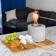 a table topped with marshmallows and crackers