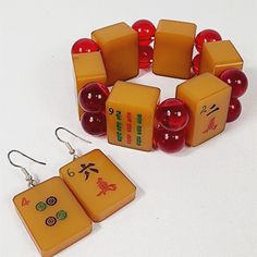 Vintage Mahjong Tile Bakelite Bracelet & Earrings Set Red Bamboo Characters Dots | eBay Red Round Jewelry Sets With Matching Earrings, Orange Bracelet Jewelry Gift, Traditional Adjustable Red Jewelry Sets, Red Adjustable Round Jewelry Sets, Gold Resin Bracelet, Orange Rectangular Jewelry As Gift, Adjustable Round Red Jewelry, Resin Bracelet Jewelry Gift, Resin Bracelet Jewelry As Gift