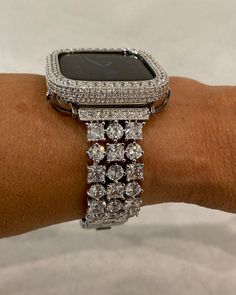 Bling Hand Made Apple Watch Band Style Replacement. Fits the Apple Watch available for sizes 38,40,42 and 44mm in series 1,2,3,4,5,6 or SE Men's & Women's. This is a custom design made to fit the Apple Watch, it is not a brand copy. Luxury Silver Apple Watch Band Women with Hand Set Princess & Round RHINESTONE Crystals & or 18K White Gold Plated Case Cover Bezel 2.5mm hand set lab diamonds. Hand-made plated rhinestone, Large square princess and round cut precise fitting and super bling effect Si Apple Watch Cover, Bling Watch, Custom Apple Watch Bands, Apple Watch Bands Women, Gold Apple Watch, Bracelet Apple Watch, Silver Bling, Ceramic Watch, Gold Apple