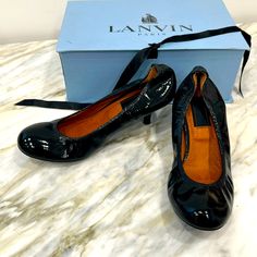 Lanvin Ballet Shoes With Heel Black 9 1/2 Brand New Lanvin Patent Leather Black Ballet Shoes With A Mini Heel, Never Been Worn From The Original Barneys Store. Super Cute And Comfy, Comes With Original Box! Designer Round Toe Heels For Workwear, Designer Patent Leather Court Shoes With Padded Heel, Patent Leather Court Shoes With Round Toe For Evening, Round Toe Court Shoes With Leather Sole For Party, Formal Patent Leather Court Shoes With Branded Insole, Party Court Shoes With Leather Sole And Round Toe, Evening Court Shoes With Reinforced Heel And Round Toe, Evening Court Shoes With Round Toe And Medium Width, Designer Court Shoes With Round Toe For Workwear