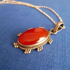 Elegant and delicate pendant from India. Carnelian in a 92.5 silver charming pendant from India. Silver 92.5 chain is included. Pendant:  4.1 x 2.1 centimeters Carnelian: 2.8 x 1.9 centimeters Weight: 18 grams Free Shipping: Certified Post Office Mail with track number Thanks for your visit! Classic Orange Necklace For Gifts, Classic Orange Necklace For Gift, Carnelian Gemstone Oval Pendant Jewelry, Carnelian Gemstone Oval Pendant, Carnelian Cabochon Pendant Jewelry, Carnelian Cabochon Jewelry Gift, Oval Carnelian Jewelry Gift, Classic Carnelian Jewelry Hallmarked, Carnelian Cabochon Jewelry As A Gift