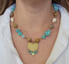 Beautiful necklace. Pearls, turquoise, and jasper with gold accents. Adjustable. 16-18 inches. Gold Bohemian Necklace With Amazonite, Gold Bohemian Amazonite Necklace, Handmade Gold Amazonite Necklaces, Handmade Gold Amazonite Necklace, Artisan Turquoise Necklace With Natural Stones In Gold, Artisan Gold Turquoise Necklace With Natural Stones, Bohemian Gold Turquoise Necklace With Natural Stones, Gold Turquoise Necklace With Natural Stones In Artisan Style, Unique Gold Turquoise Necklace With Natural Stones