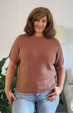 Unwind in style with our Relaxing Away Dolman Sleeve Knit Top in Coffee. Made from sweater knit fabric, it offers both comfort and a touch of sophistication. The high stretch and round neckline provide an effortless look, while the short batwing sleeves add unique flair. Perfect for a cozy day in or a night out. Fit: true to Size (wearing size small) Sweater Knit High Stretch Round Neckline Short Batwing Sleeve 55% Acrylic, 45% Cotton S: Chest 40" Length 23"M: Chest 42" Length 23.5"L: Chest 44" Stretch Fine Knit Brown Sweater, Stretch Brown Fine Knit Sweater, Brown Knit Crew Neck Top, Oversized Textured Knit Brown Tops, Oversized Brown Textured Knit Top, Oversized Brown Soft Knit Tops, Brown Short Sleeve Knit Sweater, Brown Knit Short Sleeve Sweater, Solid Color Knit Tops With Batwing Sleeves